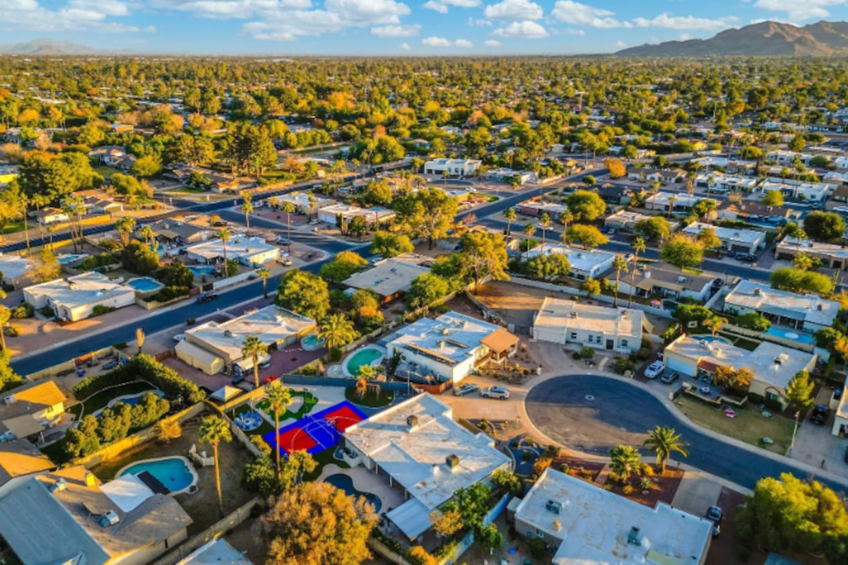 Set in a quiet, established Scottsdale neighborhood, with the property's own color-block court giving it away from the sky.