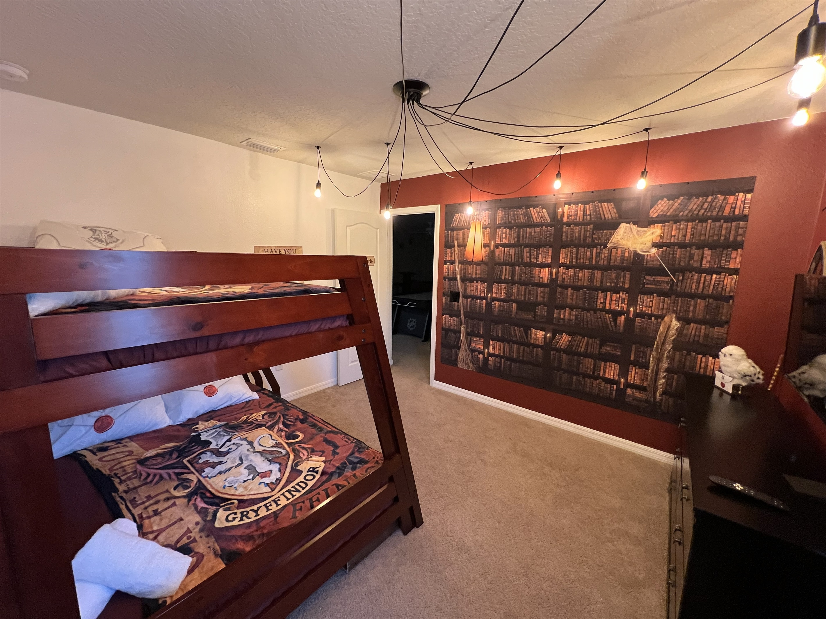 Practice your wizardry, pet Hedwig or take a "Have you seen this wizard" selfie in this fun Harry Potter themed room