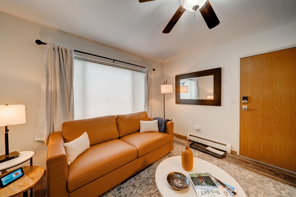 Plenty of natural light awaits you in this cozy and comfortable living room.
