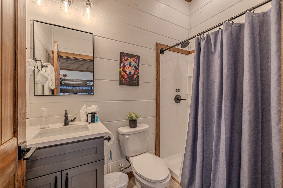 Full ensuite bathroom upstairs in the full-bunk room.