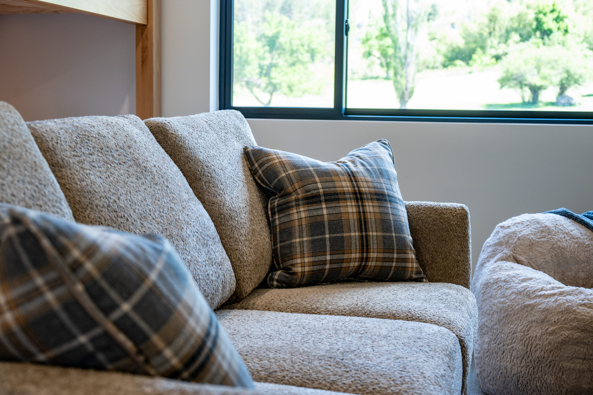 Comfortable sleeper sofa creates extra room upstairs.
