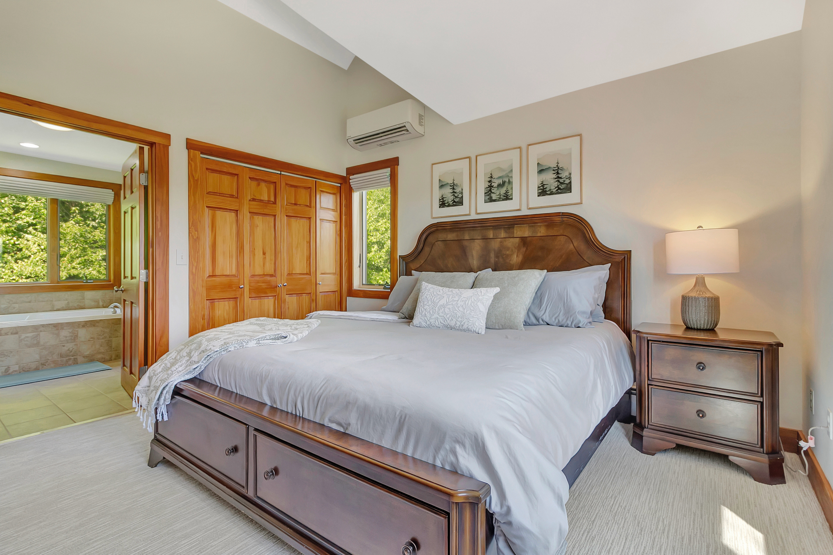 Another king bedroom upstairs with amazing lake and mountain views. 