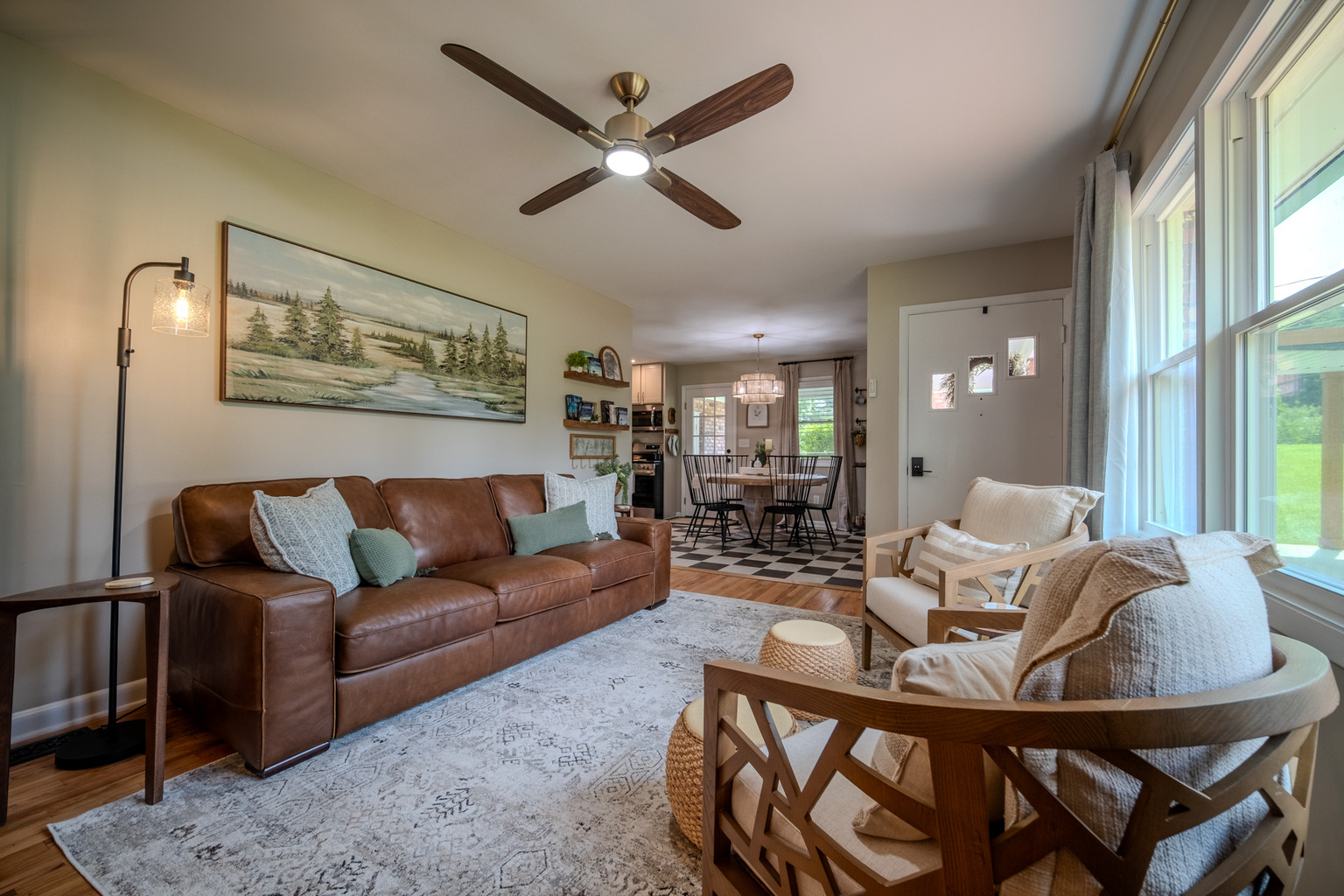 Open-concept living area with and easy access to the dining space.