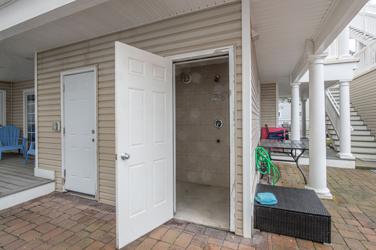 Outdoor Enclosed Shower Stall and Lower Patio Storage Area