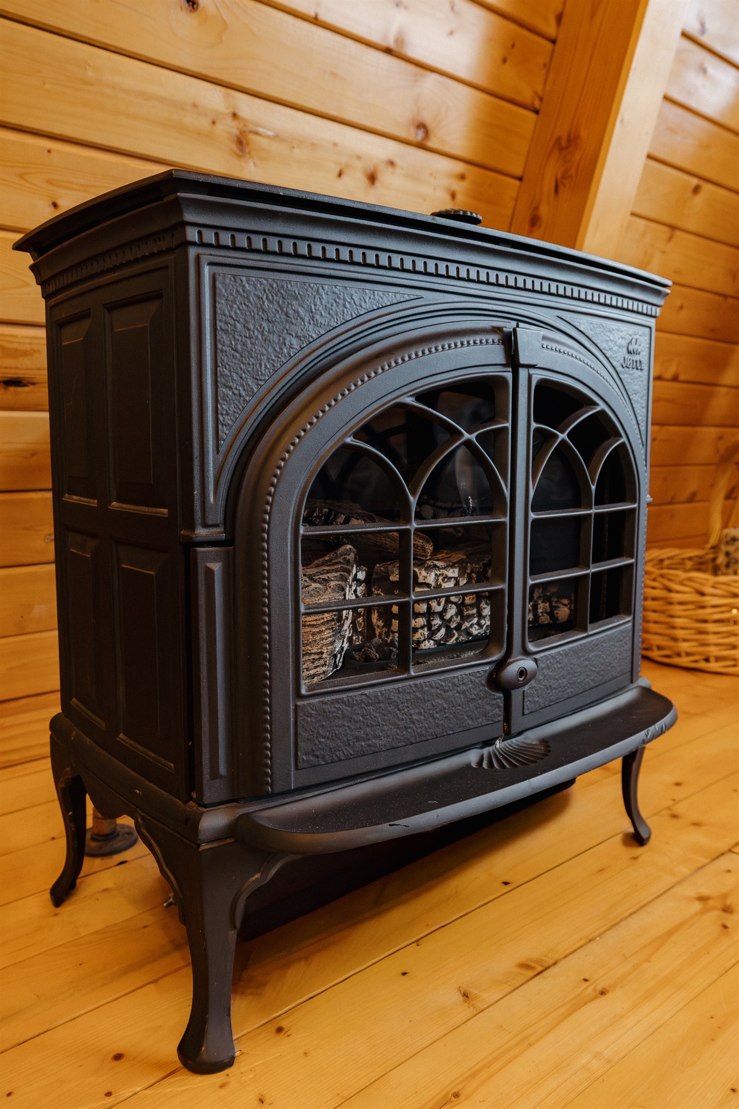 Freestanding natural gas fireplace (currently not operational). This fireplace is not needed for heat, and a replacement is in progress.