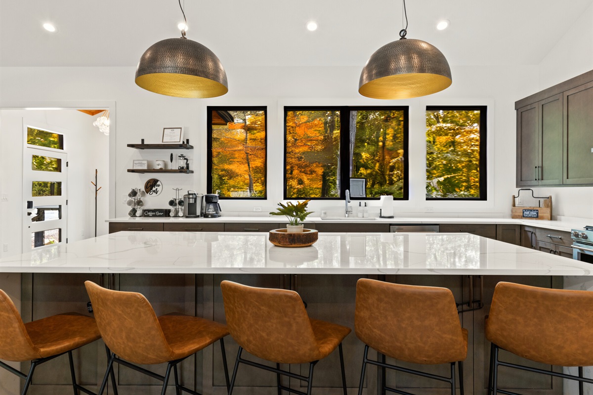 The chic pendant lighting is perfect for casual meals or evening conversations.