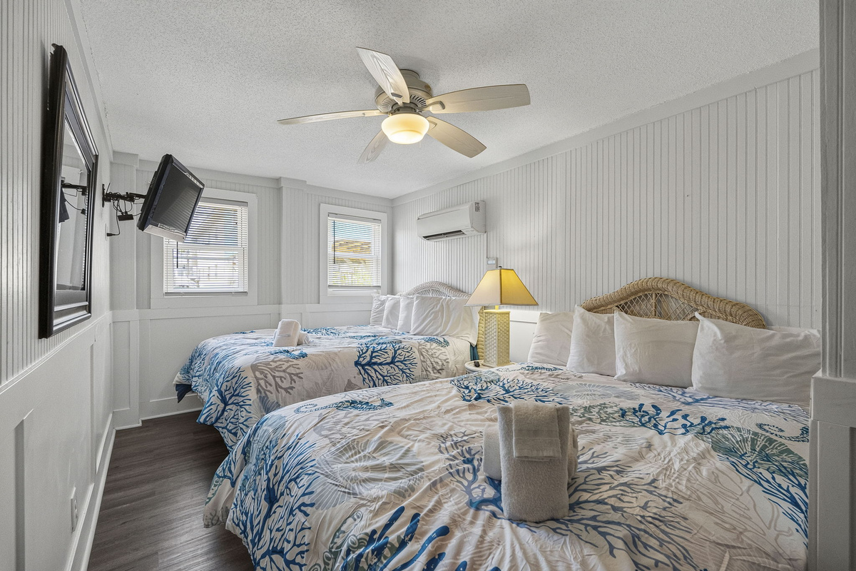 Guest Bedroom in Unit 2 with two Queens