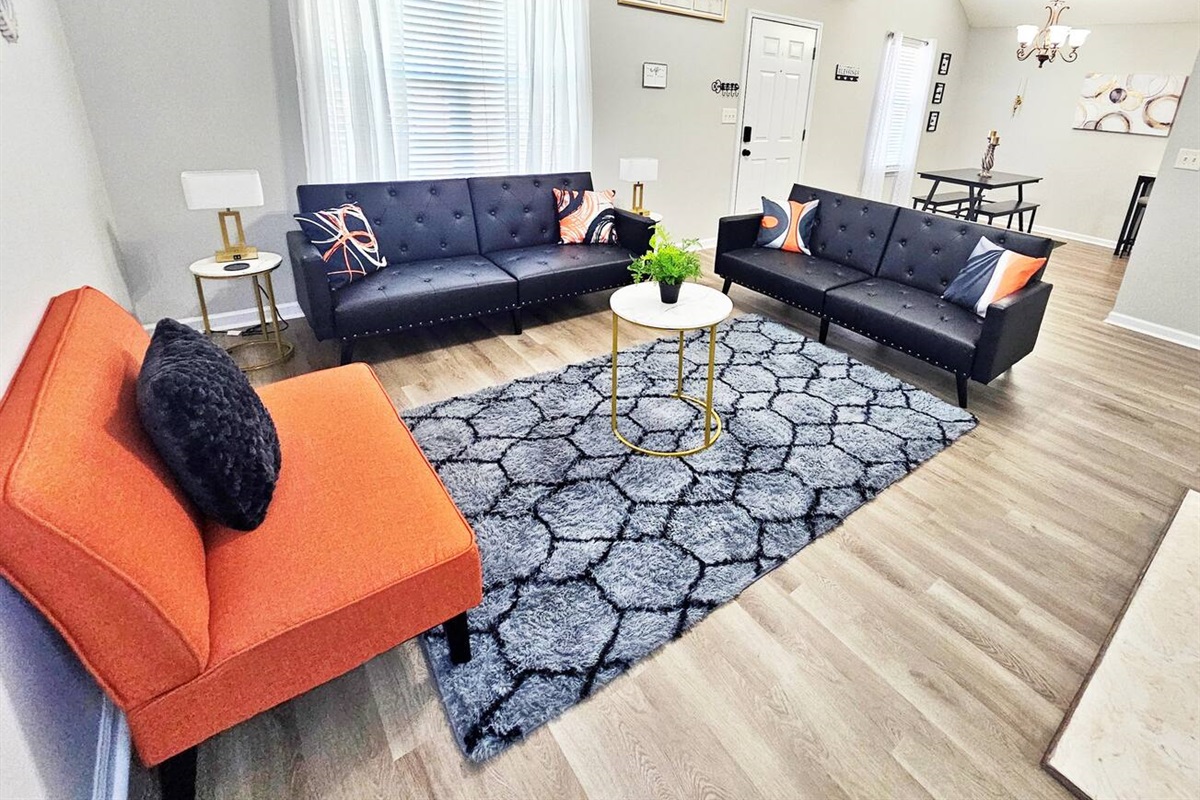 Kick back, relax in this comfy living room, and watch your favorite movie or show on the 55-inch flat-screen smart TV. Both sofas are sleeper beds!