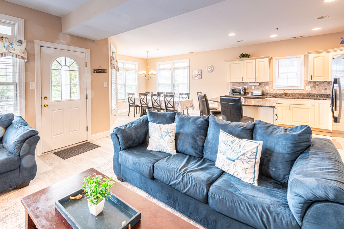 Open-Concept Living Room with Blue Sofa