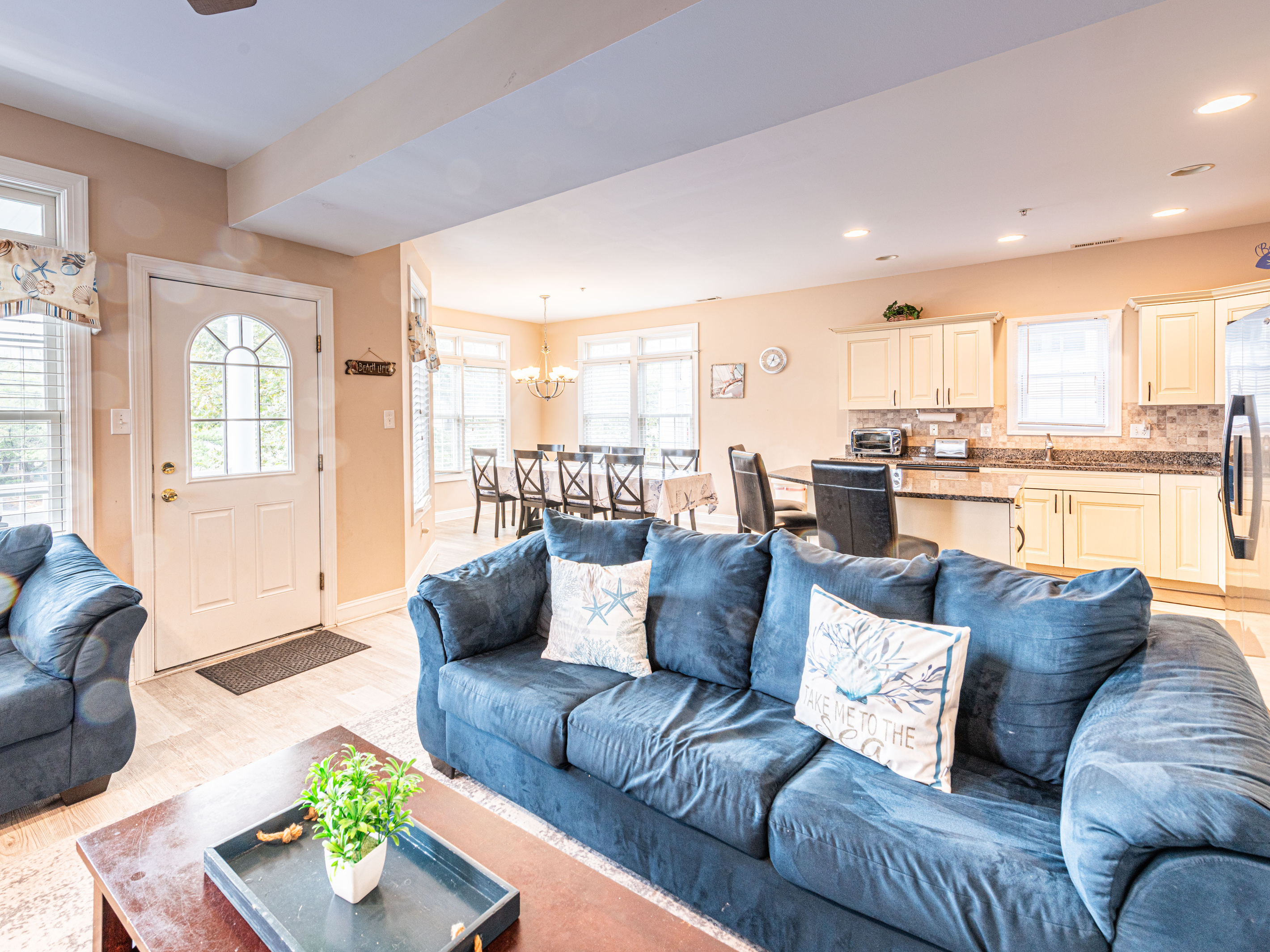 Open-Concept Living Room with Blue Sofa