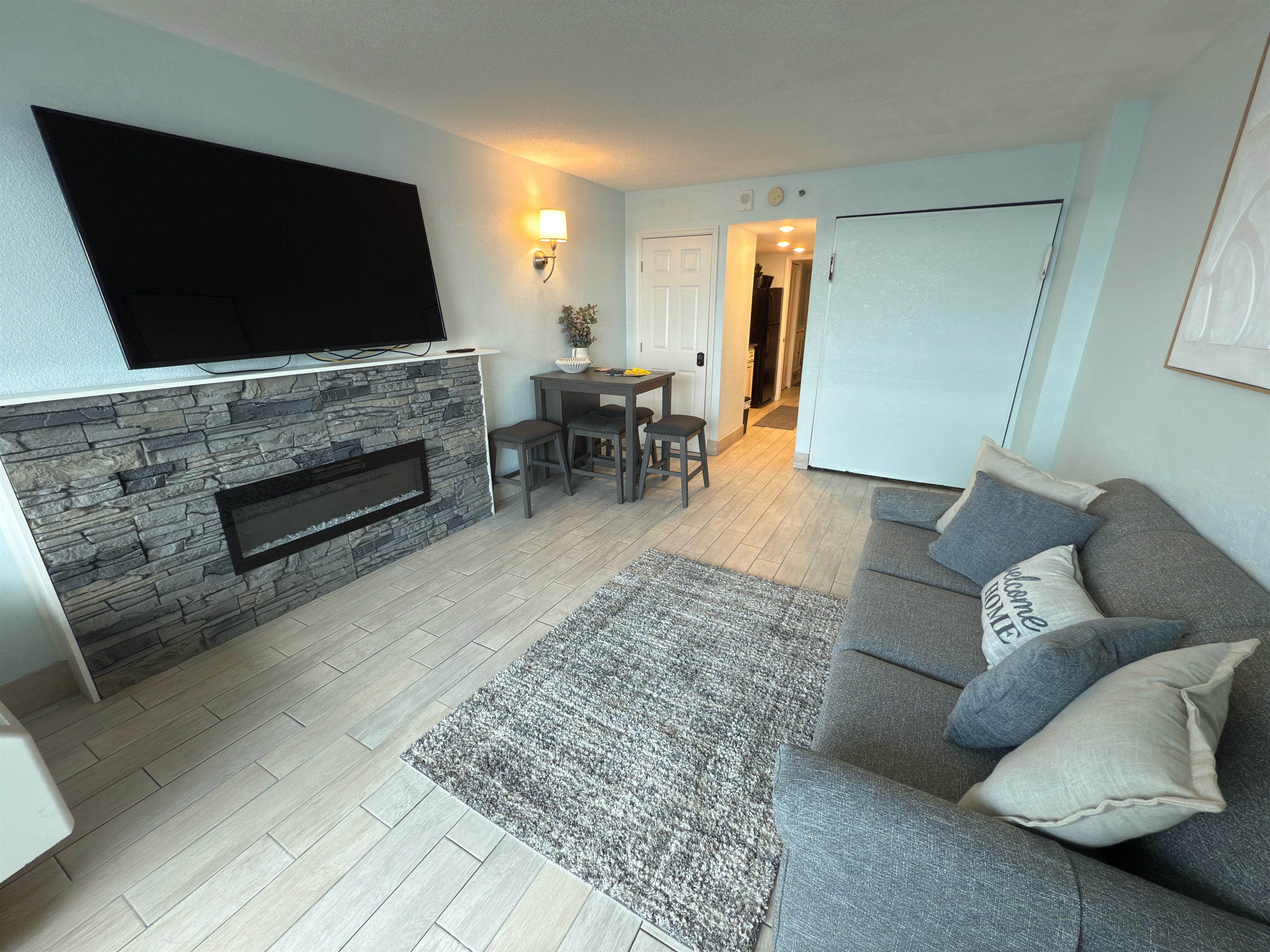 Living room with sofa bed and Murphy bed