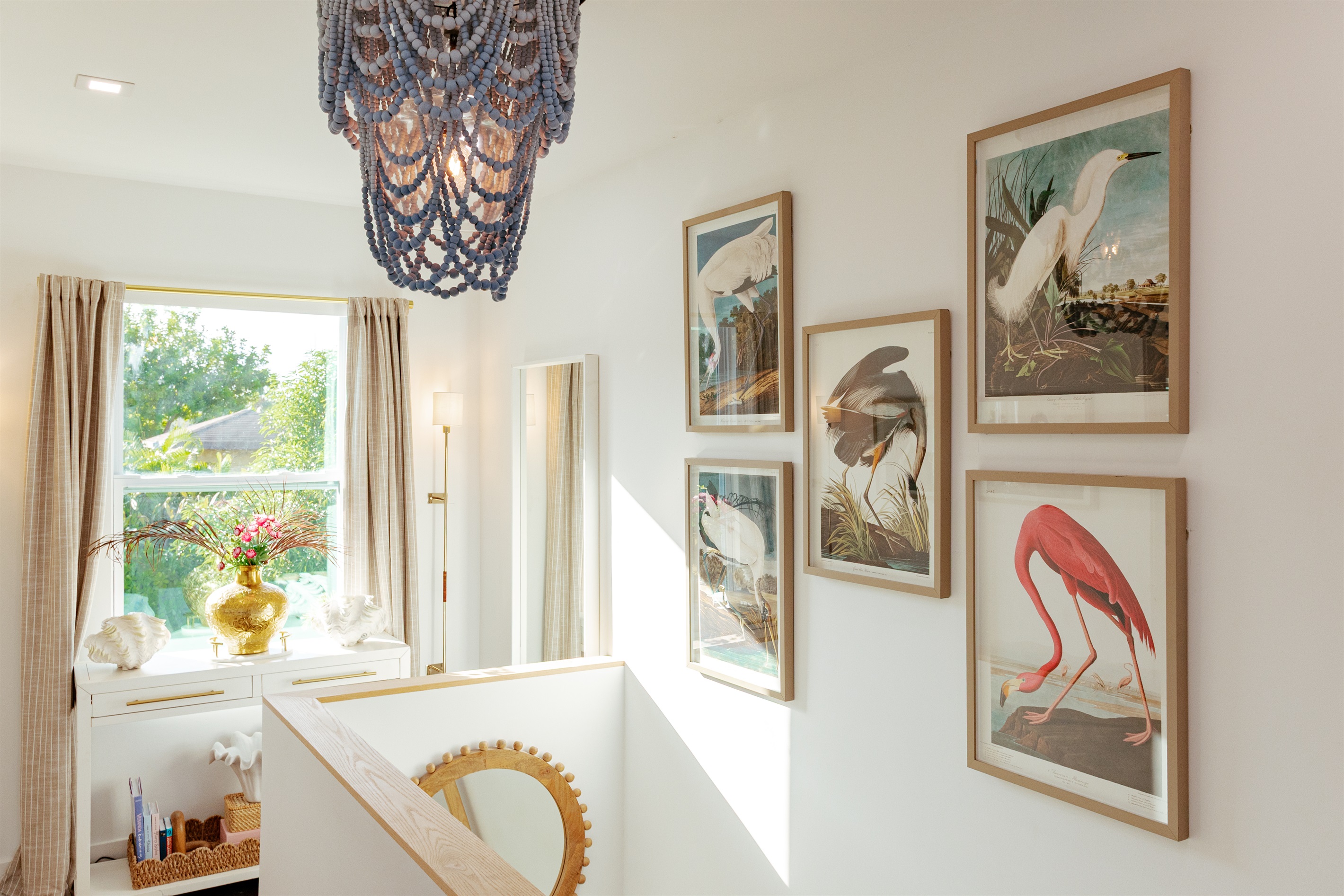 As you head upstairs, drawings of fowl local to the area bring the outdoors inside.