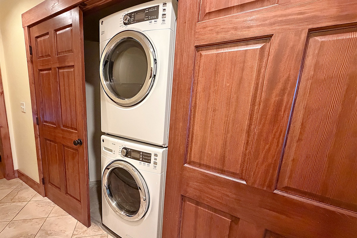 Full size washer and dryer on lower level.
