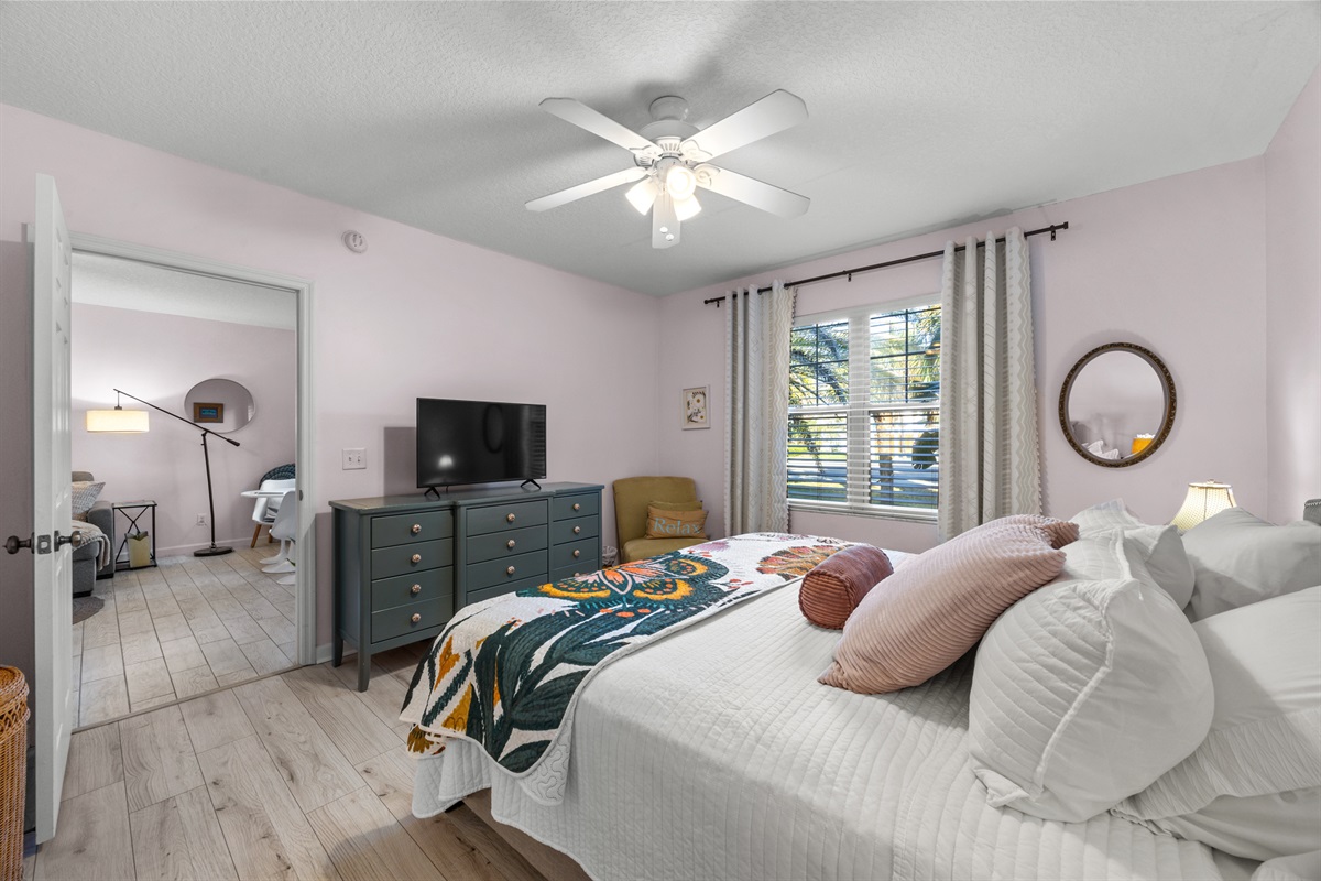 Inviting bedroom with modern décor and a peaceful, calming color palette.