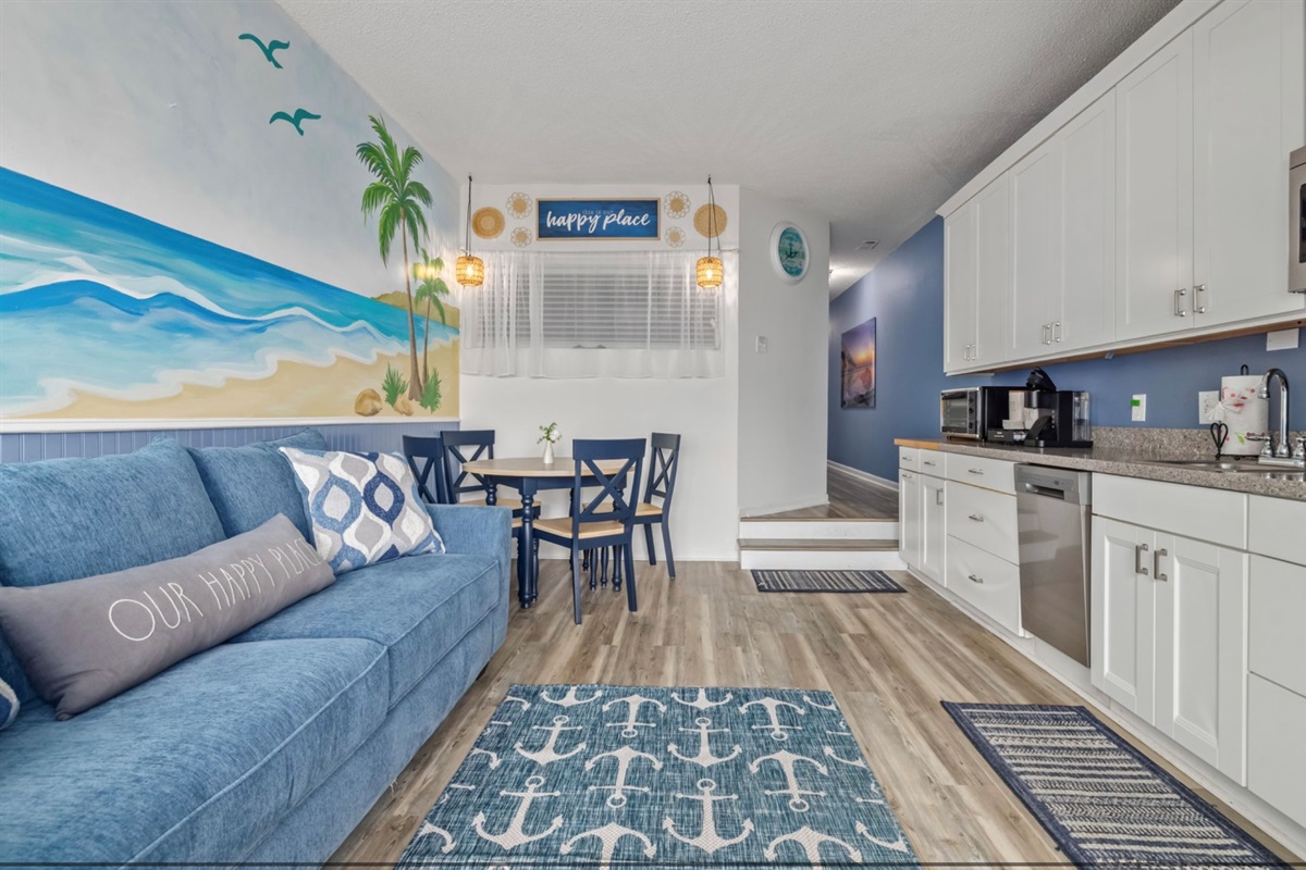 Open-concept living, dining, and kitchen designed for connection, relaxation, and easy vacation living.