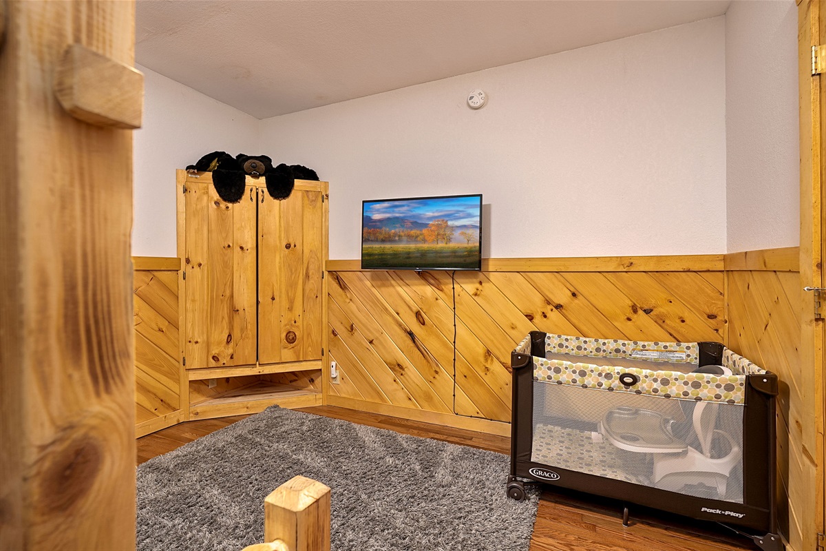 Leave the pack n play at home and use the one at the cabin! 