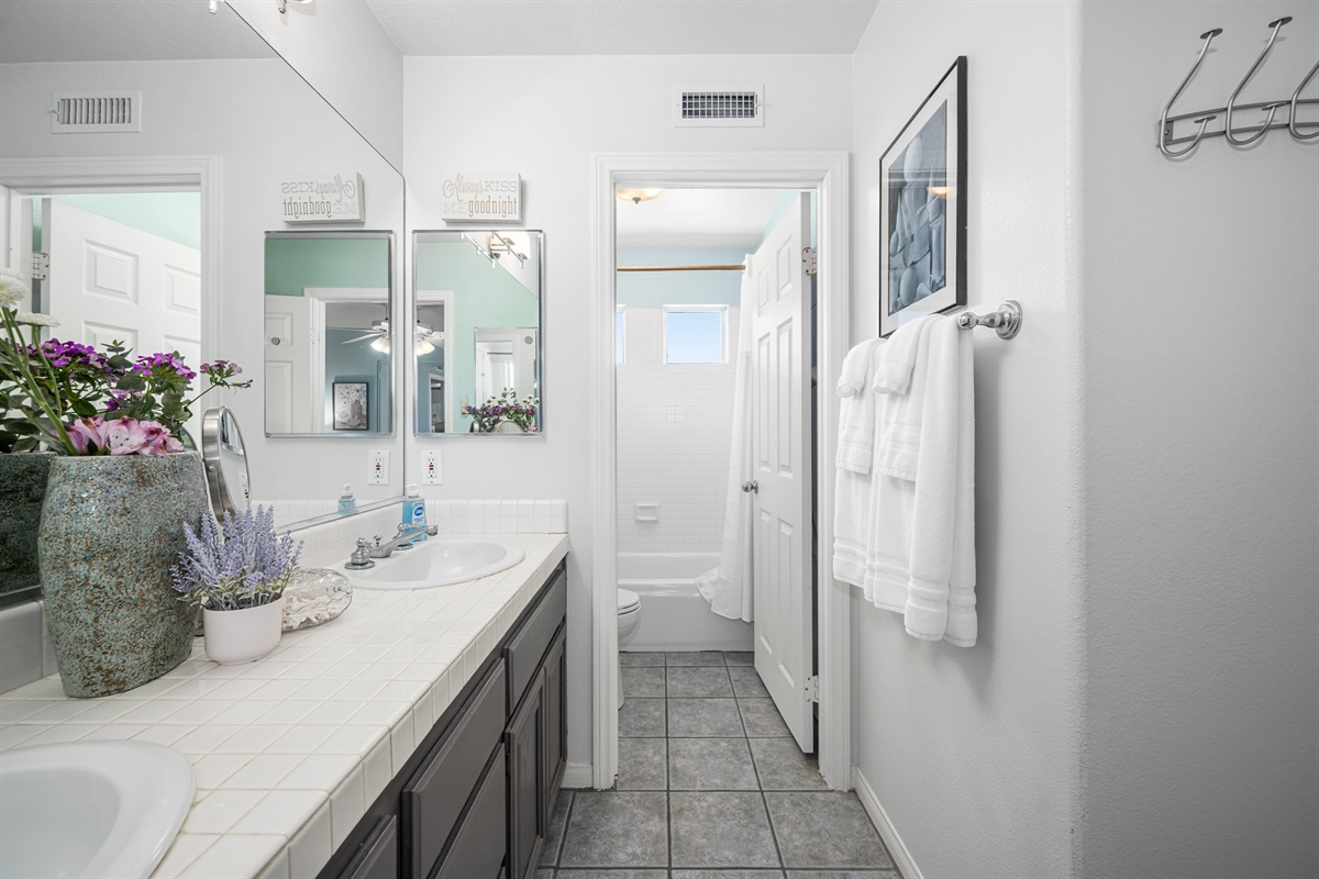 Ensuite Bath, two sinks with private shower and toilet area