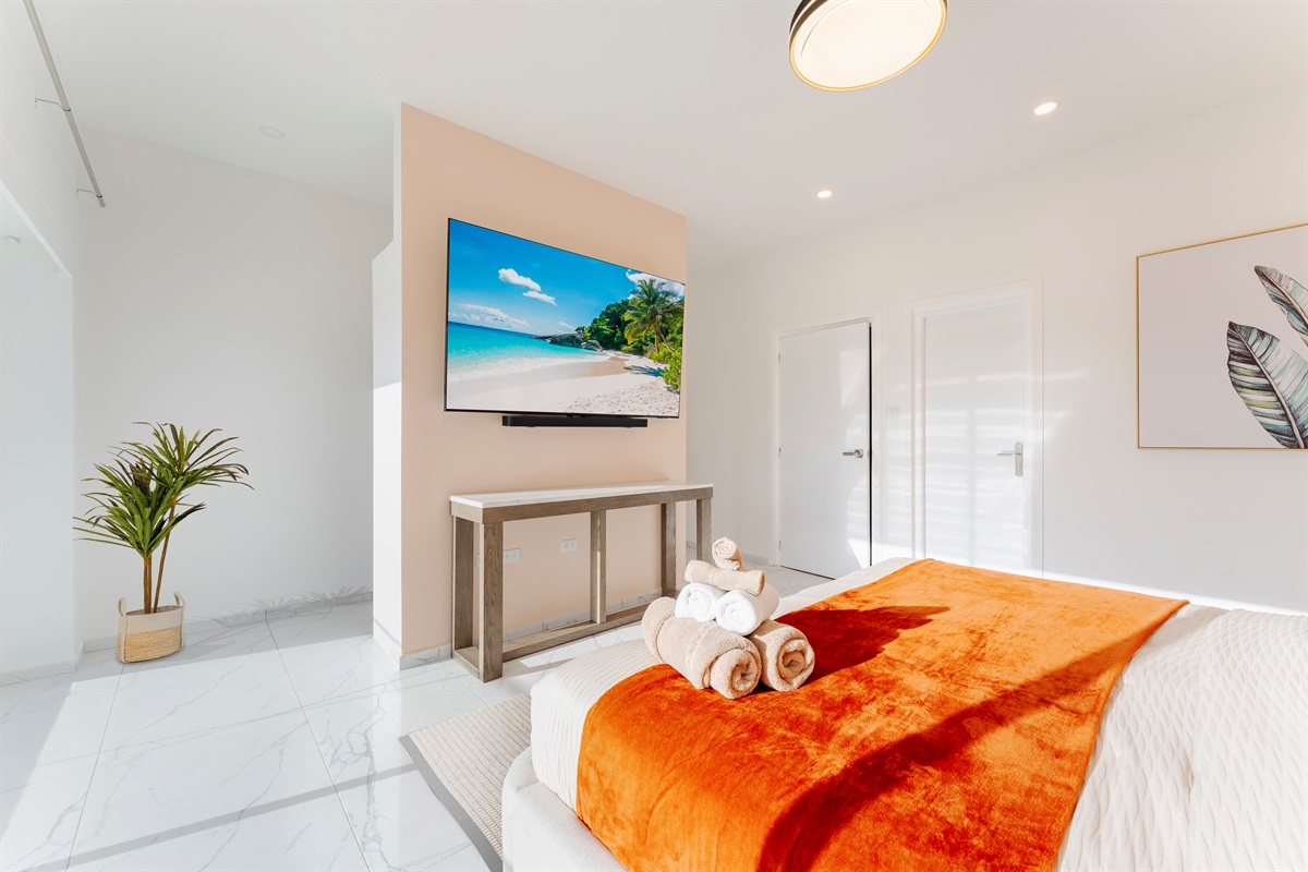 Enjoy your own 65" Smart TV in the comfort of the primary suite