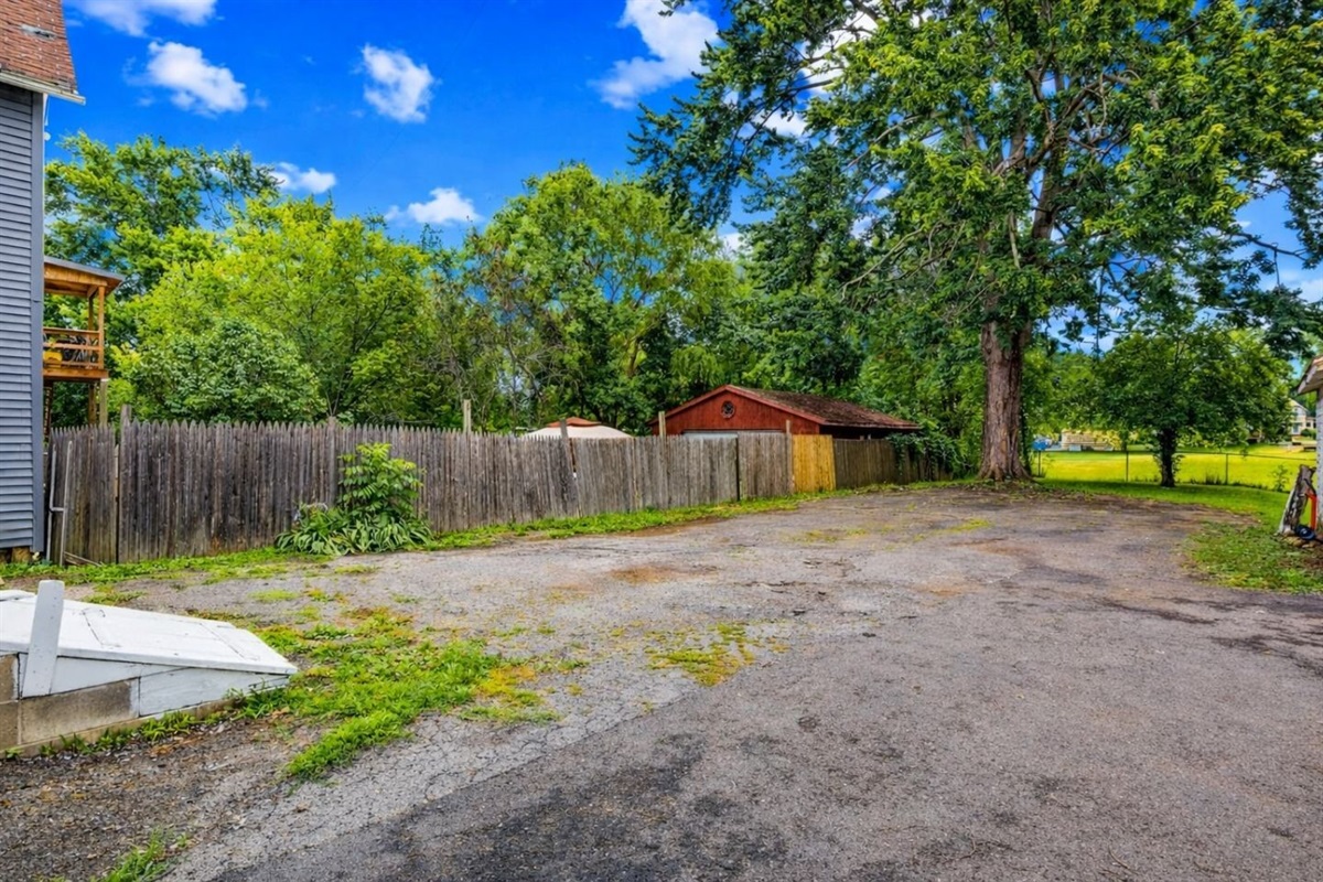 Parking for 2-3 Vehicles, other parking available on the street.  If you park anywhere besides the area seen in this picture, you are parked in the neighbors driveway.  