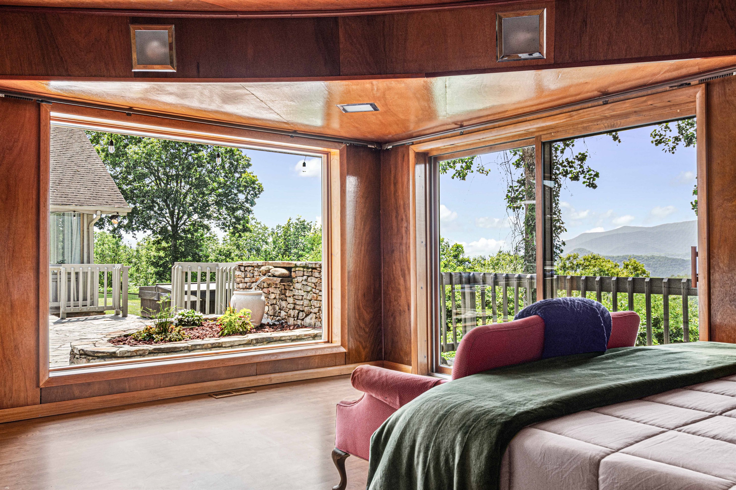 Enjoy stunning mountain views from this beautifully designed room with natural light!
