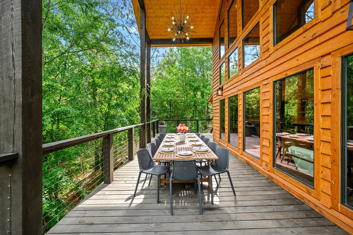 Share meals outdoors under the pines and string lights.