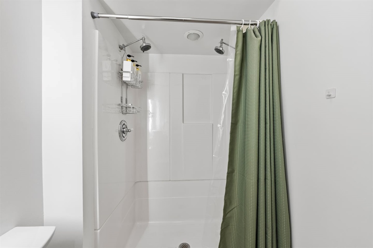 Bright, spacious bathroom with luxury finishes and large vanity.