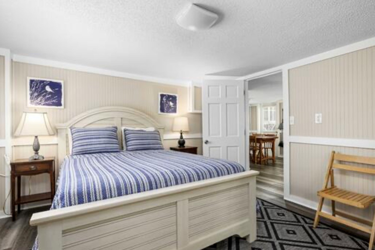 Drift off in a calm, coastal bedroom with soft bedding and plenty of natural light. ⭐