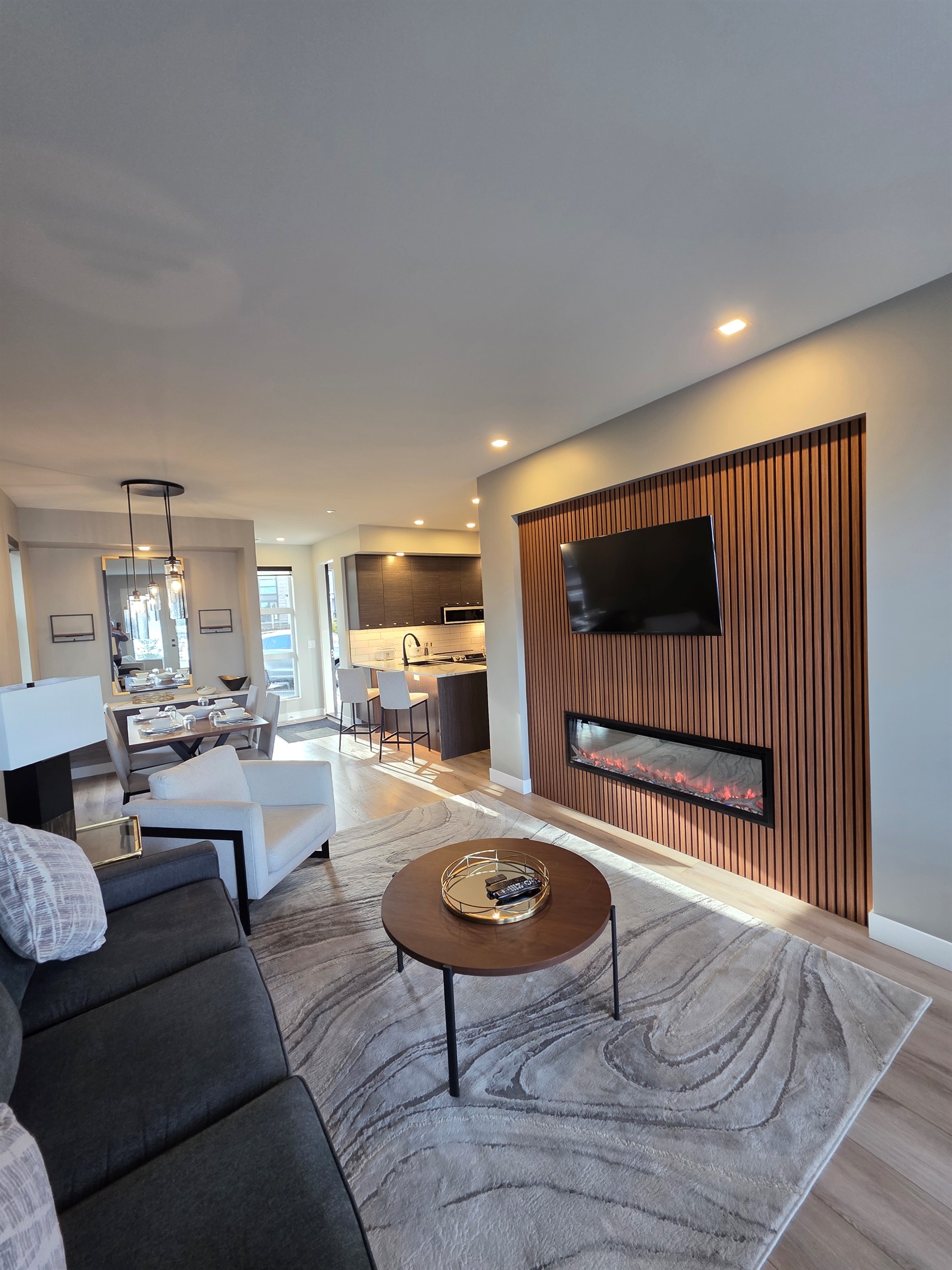 Streaming TV and Fireplace in Living Room.