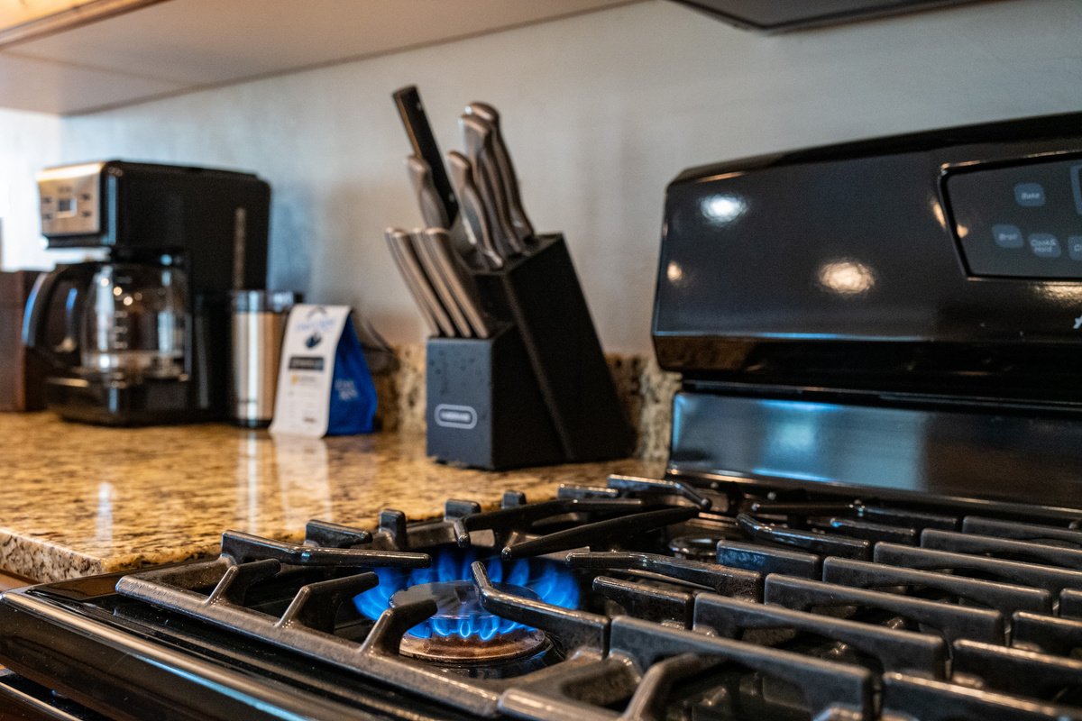 Prepare favorite meals with the gas cooktop and convenient kitchen essentials.