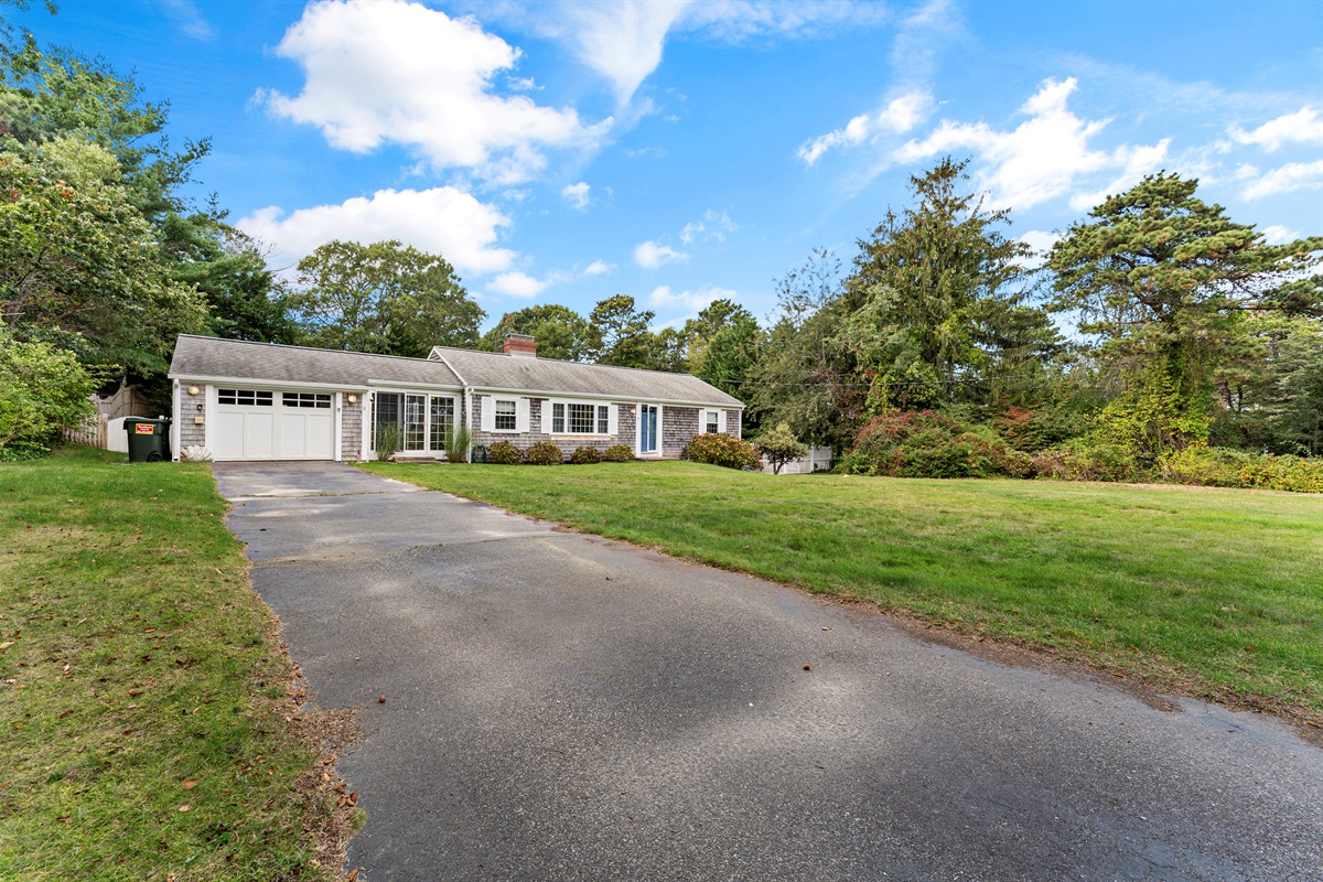 Our wide driveway is all yours—just please park on it and leave the grass untouched!