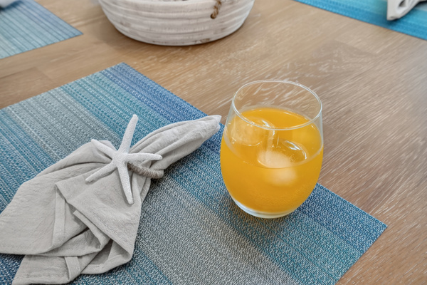 Thoughtful coastal touches invite you to pour a refreshing drink and settle into island time.
