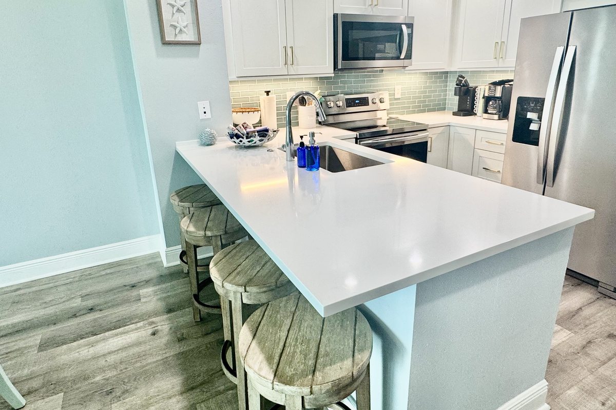 Bar seating is the perfect spot to park for a quick bite before heading back to the beach! We can seat 4 at the bar!!