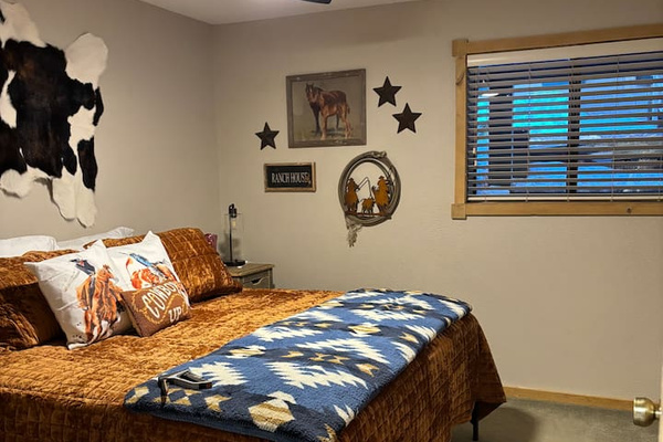 Guest Bedroom - Window to look out at the back covered patio