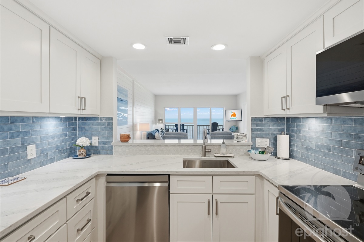 Kitchen with full-size refrigerator