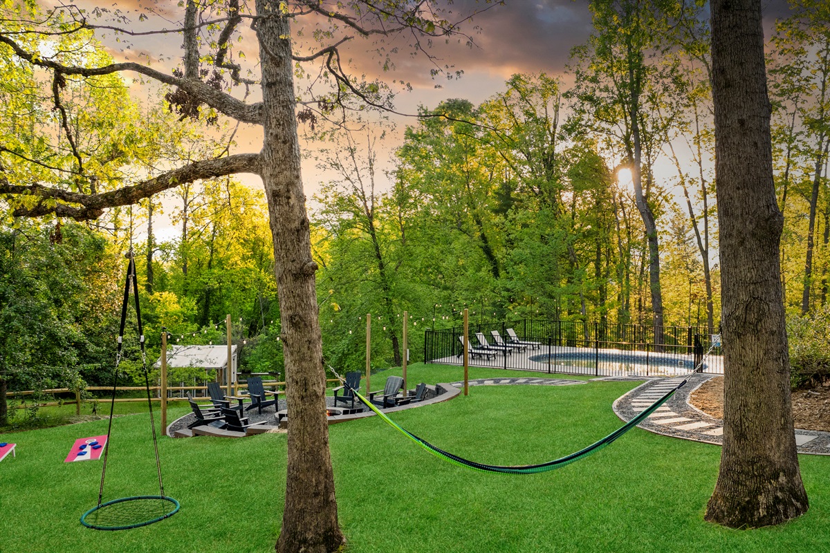 Catch a breeze in the hammock, swing under the trees, or challenge friends to a game — all while soaking in the forest views. This is what relaxation feels like in Asheville.
