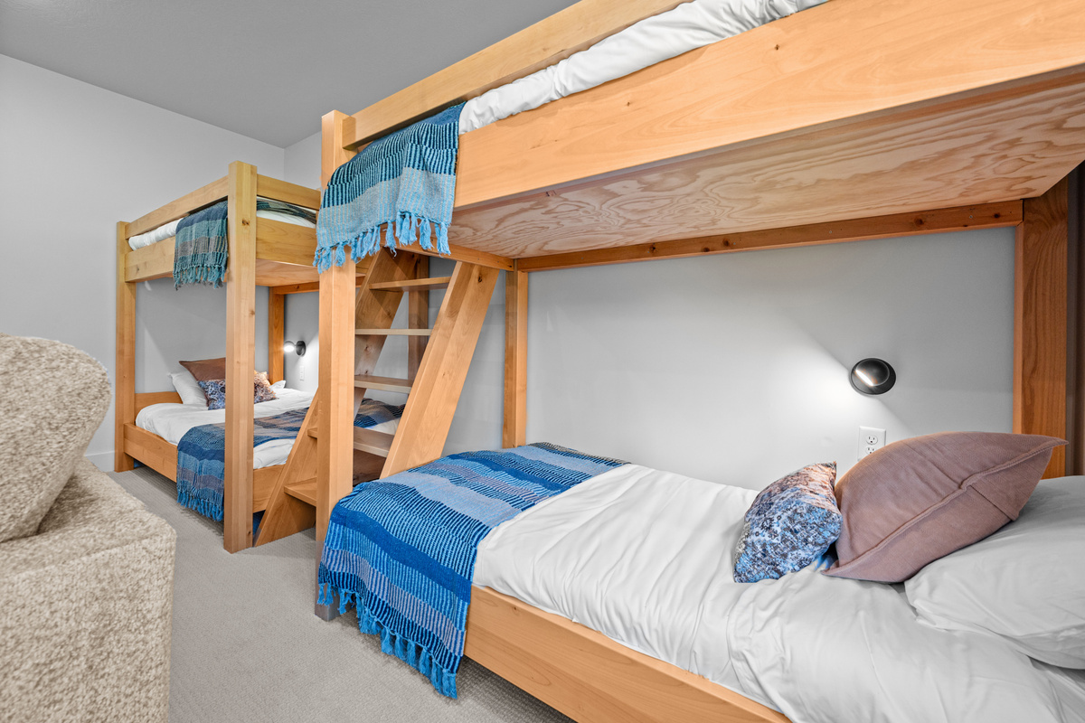 Twin-over-twin bunk beds offer comfortable sleeping for younger guests.