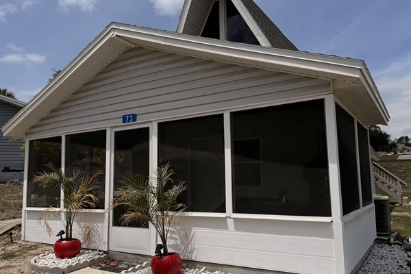 Simple "hidden in plain sight" exterior -- don't let the unassuming aesthetic fool you, the interior of Mario's Mini Mansion place is absolutely LIT!