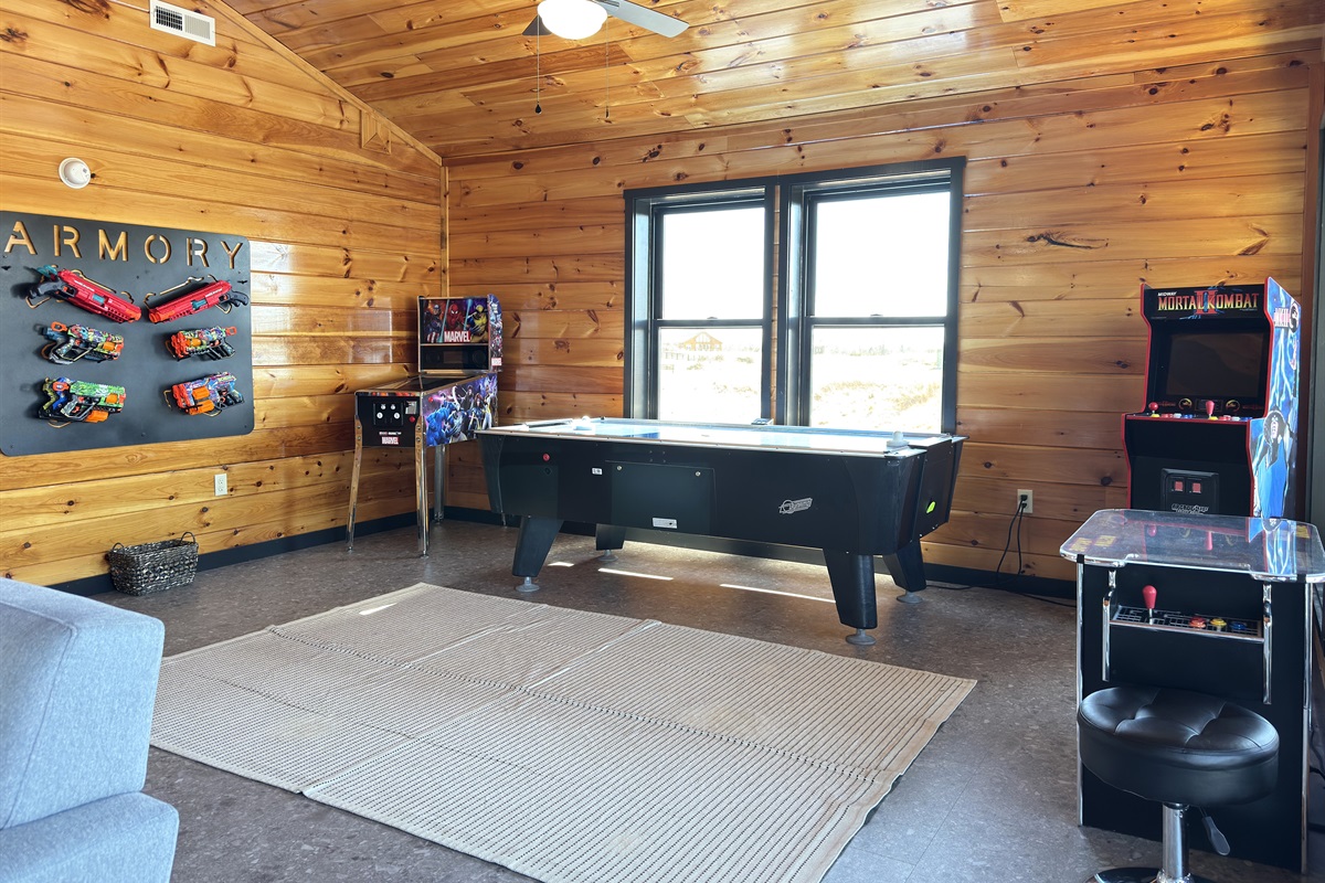 In our game room we have retro arcades + a commercial air hockey table and nerf blasters!!