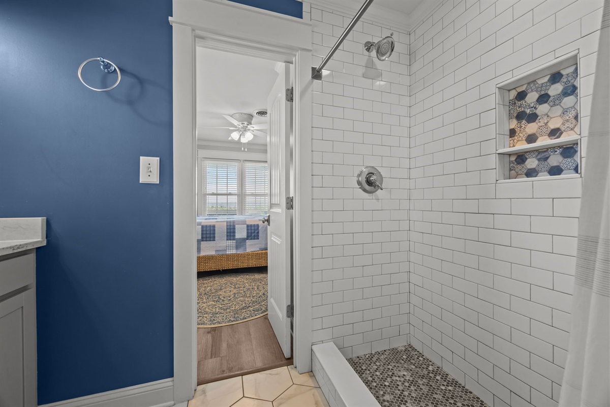 Fresh and clean — enjoy the upgraded tiled shower after a day by the water