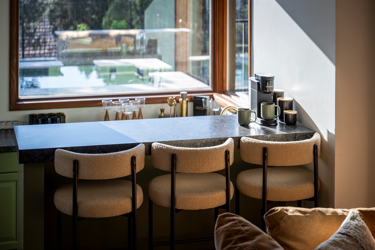 Stylish bar with seating for your morning routine.