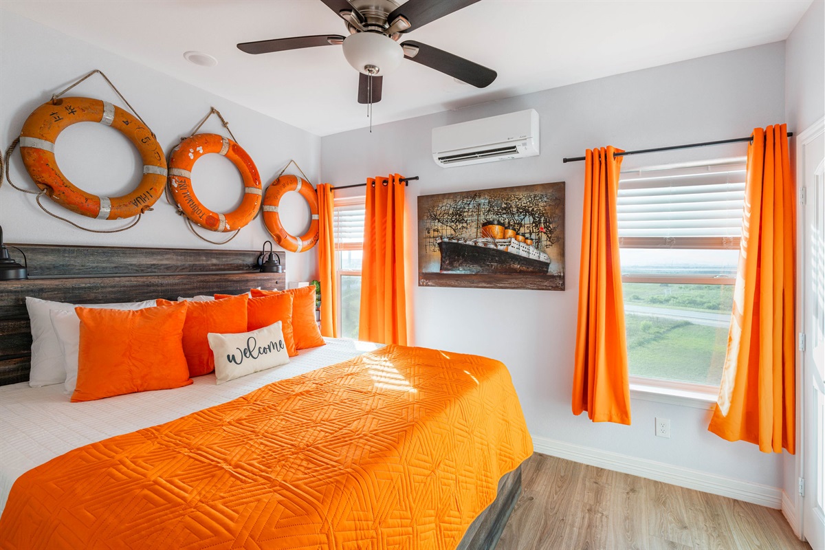 Titanic Suite alt angle (main floor) — one step off the living room, private ensuite just beyond.