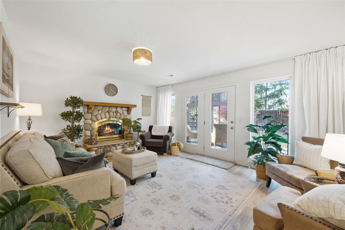 Family room is ground floor and works well for game night in front of gas fireplace.