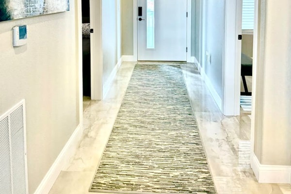 Wide hallways and well lit entry 