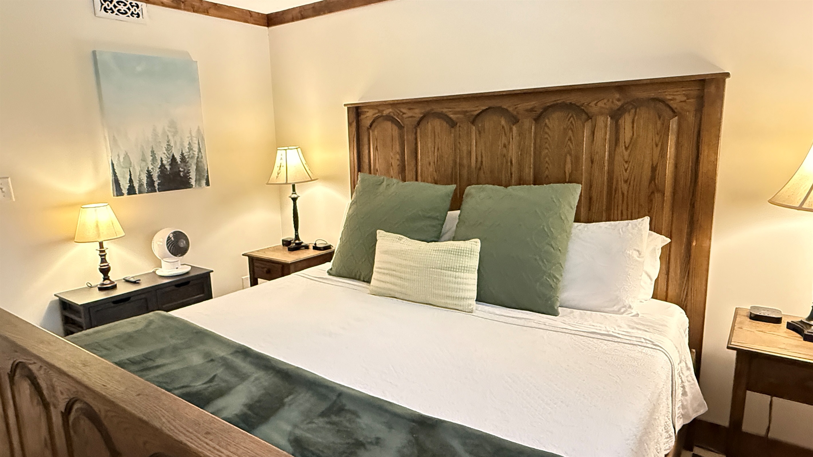 Luxurious king size bed with multiple pillow choices.  A fan for a gentle breeze.  A sound machine for the gentle sound of rain fall or ocean waves.  - A perfect recipe for you to get a great night's sleep.