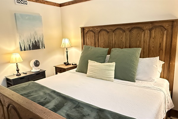Luxurious king size bed with multiple pillow choices.  A fan for a gentle breeze.  A sound machine for the gentle sound of rain fall or ocean waves.  - A perfect recipe for you to get a great night's sleep.