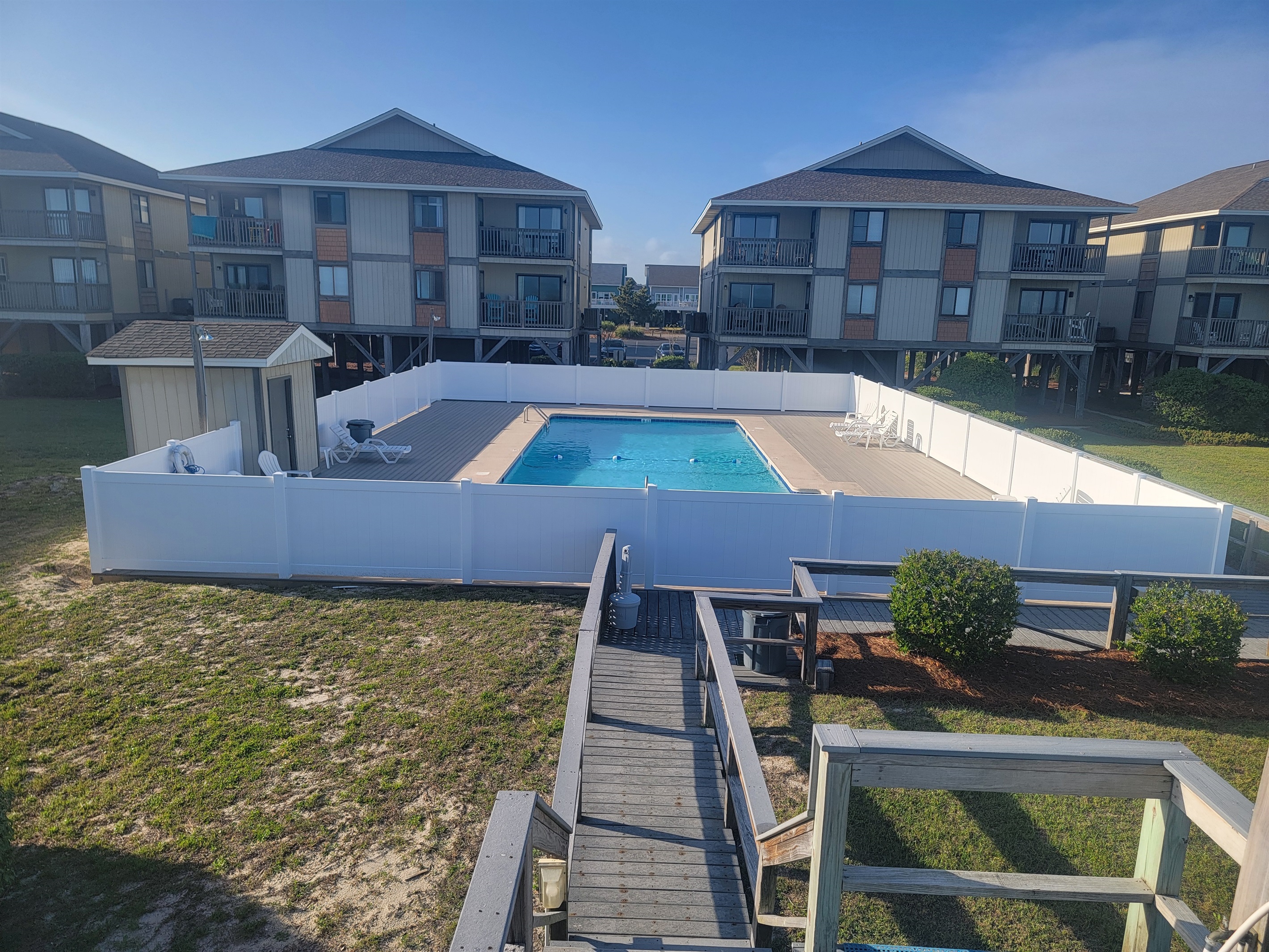 Pool with new deck and fencing