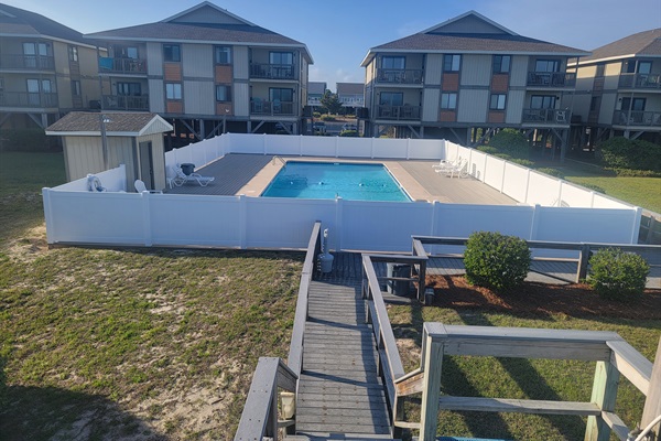 Pool with new deck and fencing
