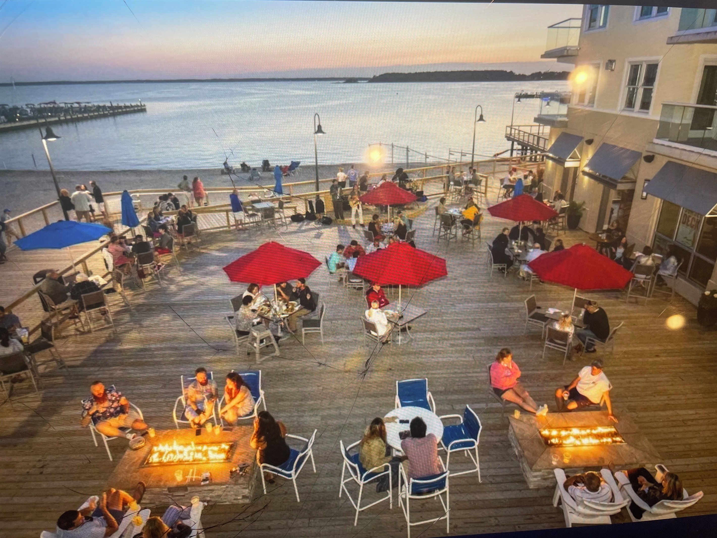 Boardwalk with firepits overlooking bay