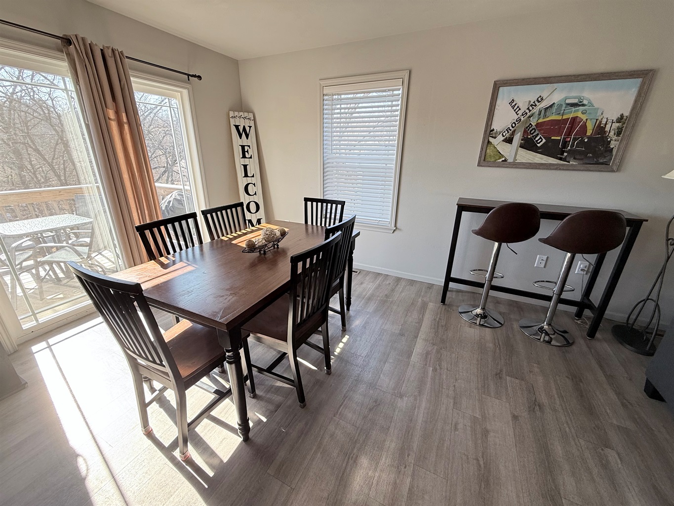 Dining area overlooks outside deck