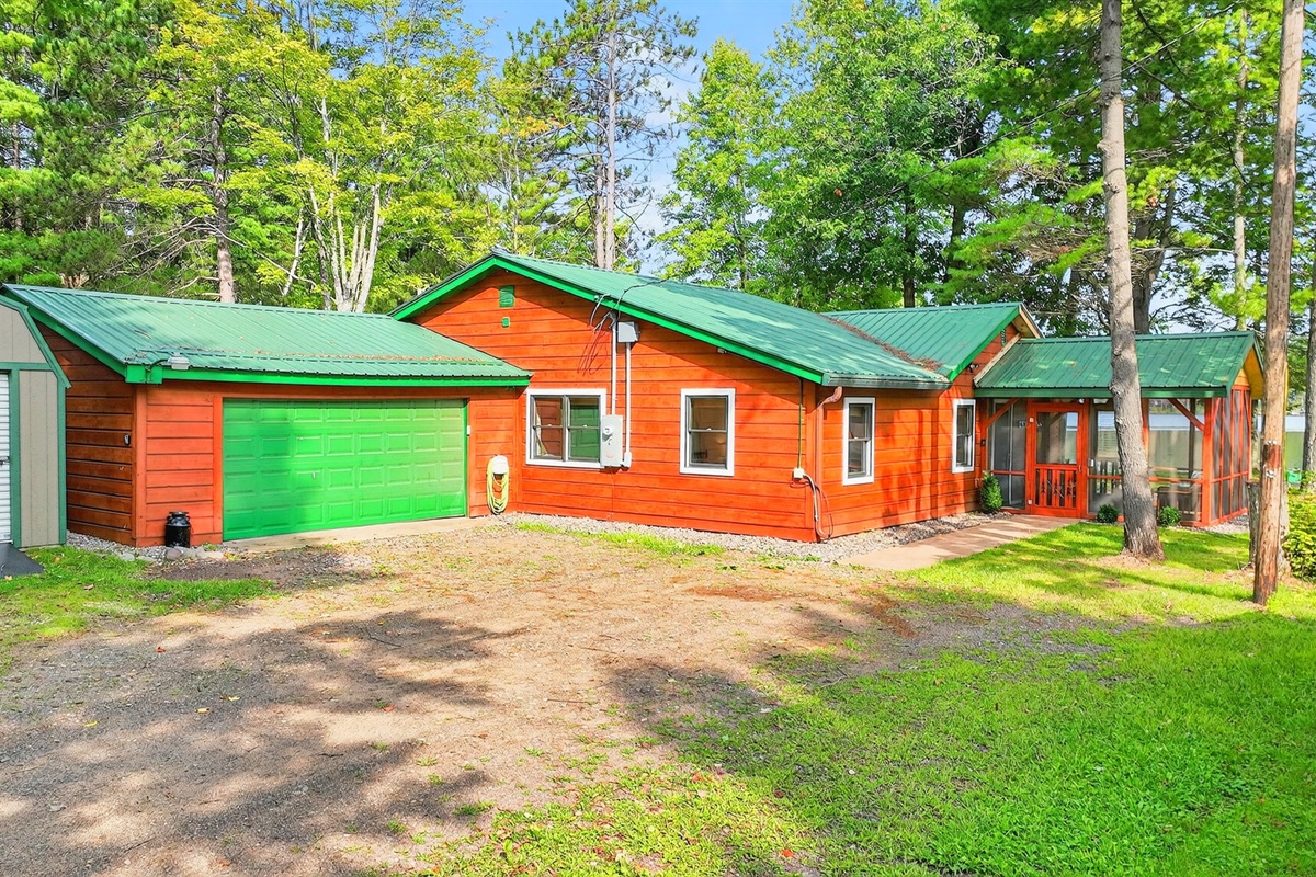 The driveway has ample parking for you vehicles and trailers. Note: the garage is not available for indoor parking.